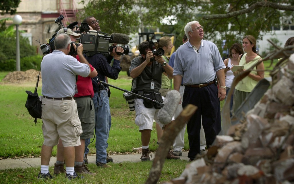 Scott Cowen '68 surveys the damage from Hurricane Katrina (Tulane University)